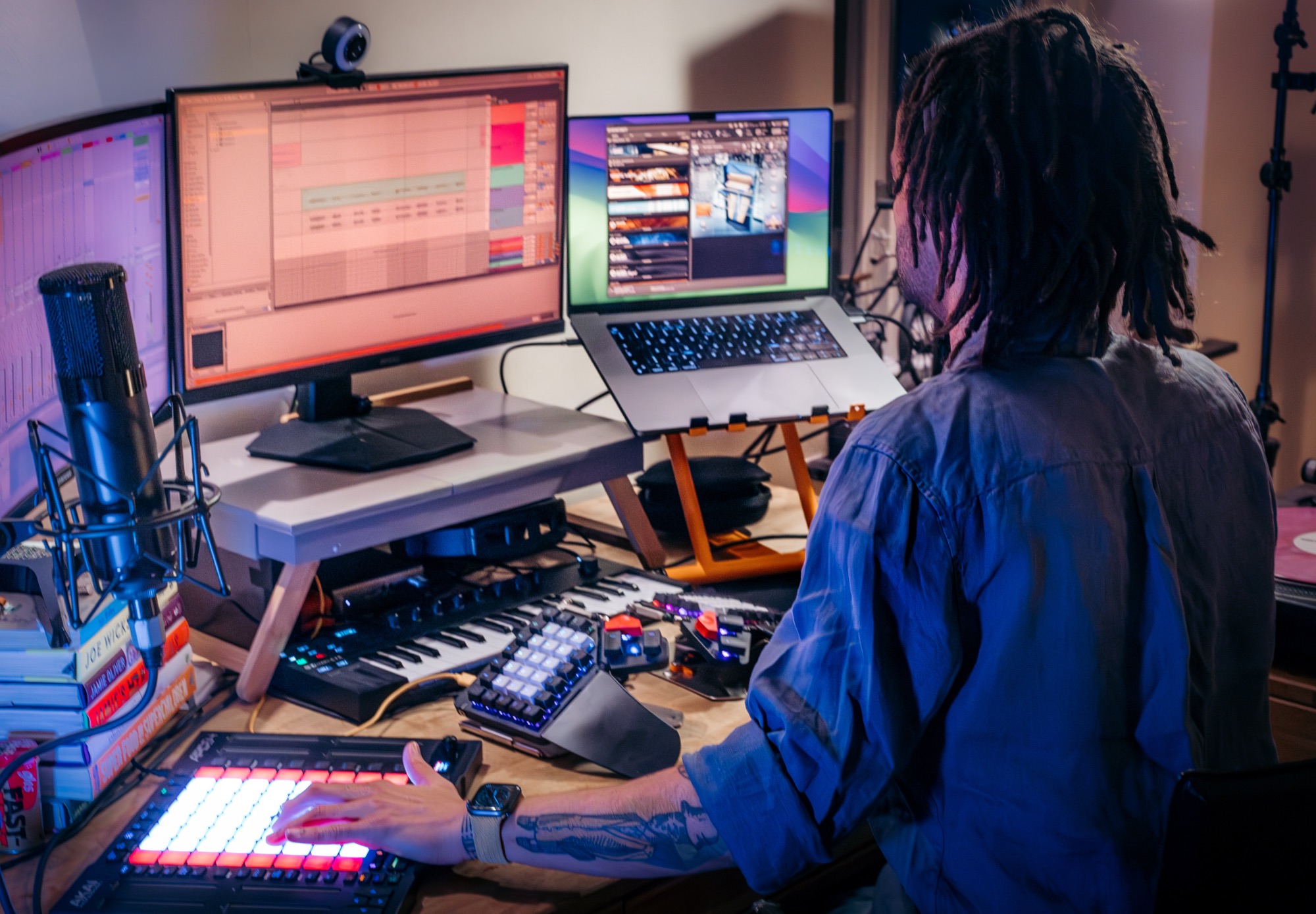 Working at the desk in the Echo Era Audio studio